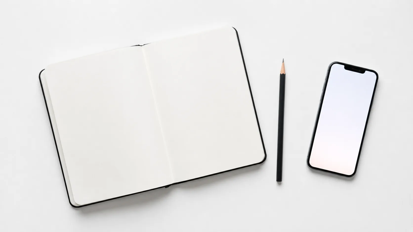 Open notebook with pencil and smartphone showing chat interface on a clean desk — AI handling tutoring centre enrollment enquiries
